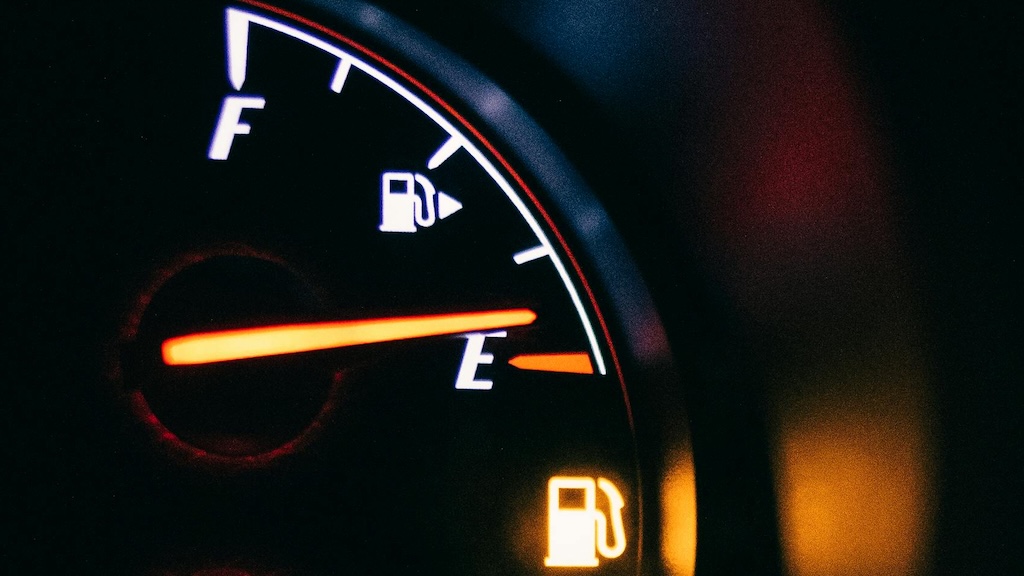 A fuel gauge showing nearly empty
