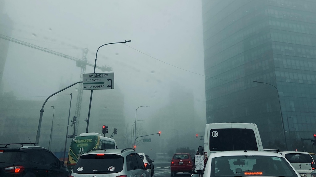 Cars in city with extreme air pollution