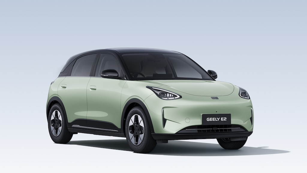 A light-green Geely E2 electric car