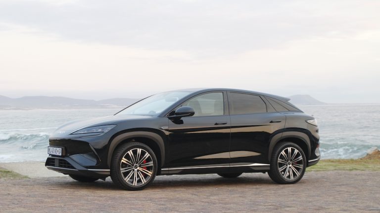 Black BYD Sealion 7 Performance with ocean backdrop