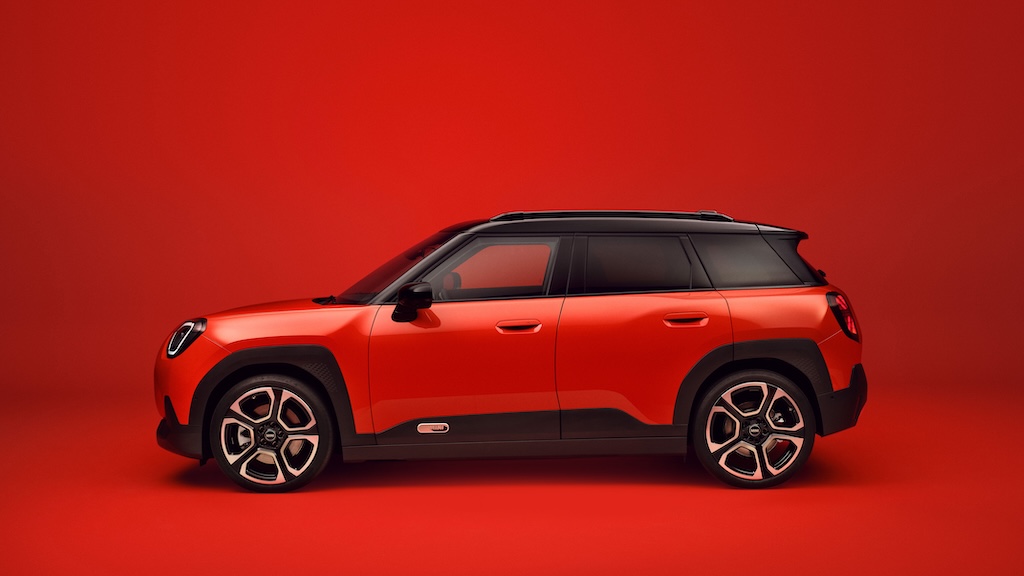 RED MINI Aceman in profile, red background