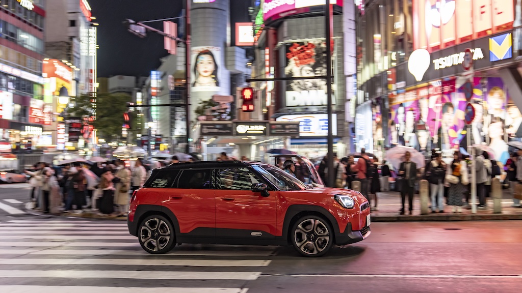 Red MINI Aceman SE on a Tokyo street at night