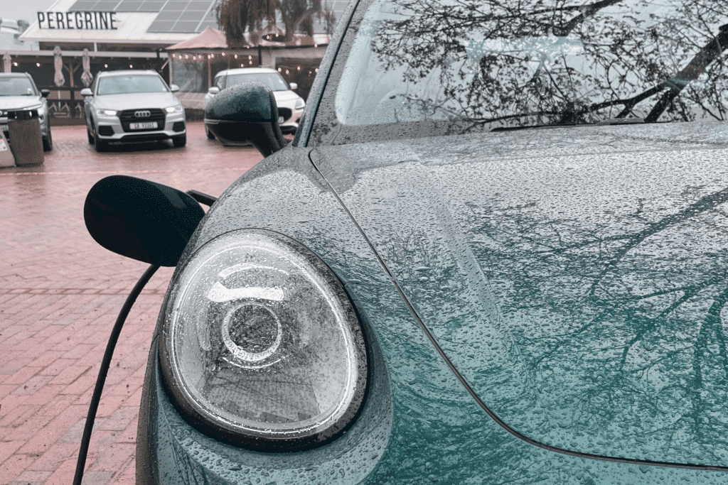 Parked outside the iconic Peregrine Farm Stall, highlighting how seamlessly local road trips and EV charging integrate.